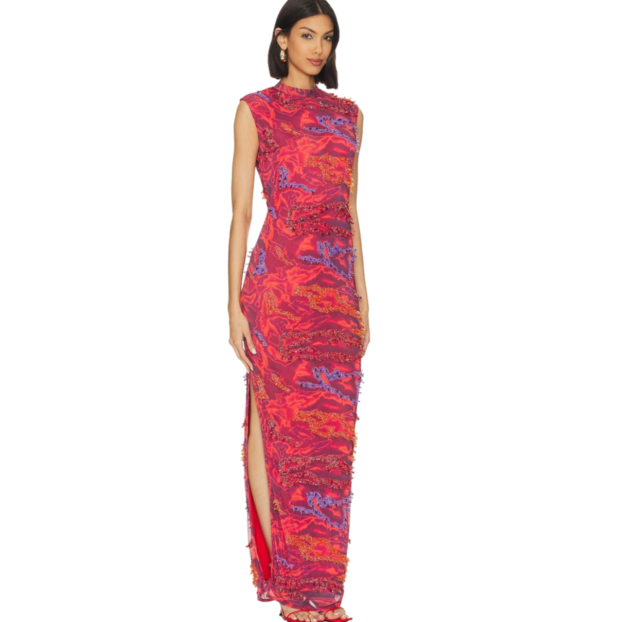 Woman wearing a red and blue patterned dress on a white background